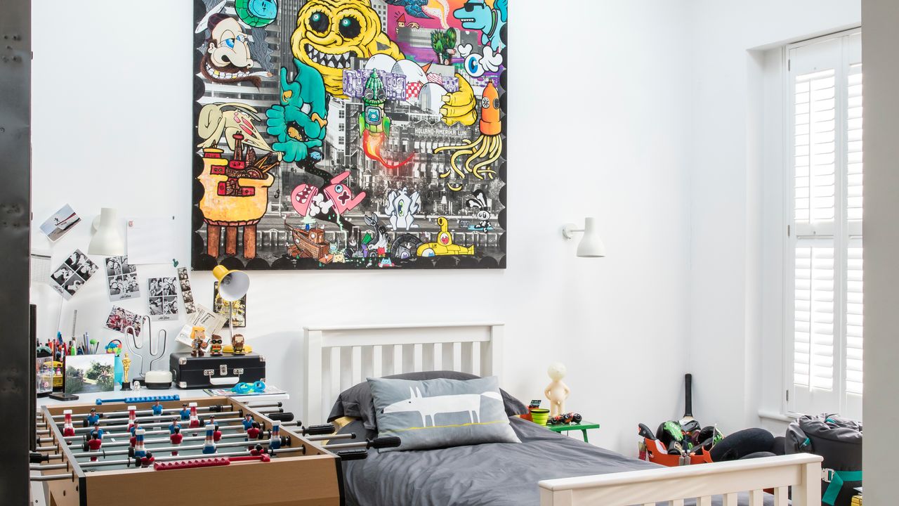 Teen bedroom with graffiti print 