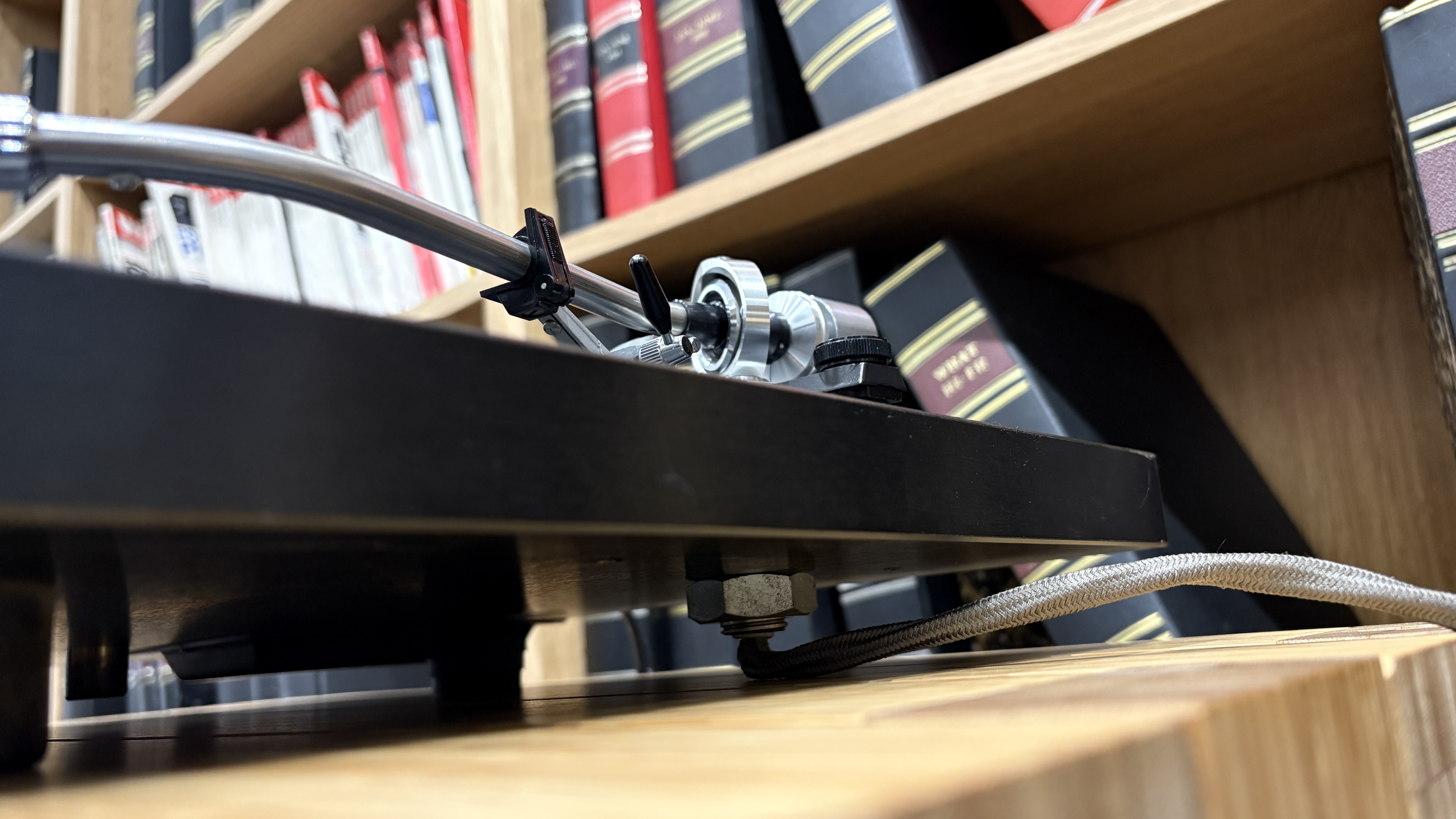 Original Rega Planet turntable with Acos Lustre tonearm on wooden hi-fi rack