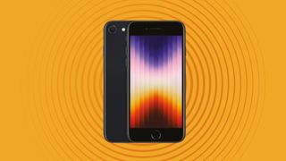 Apple iPhone SE 2022 on orange background