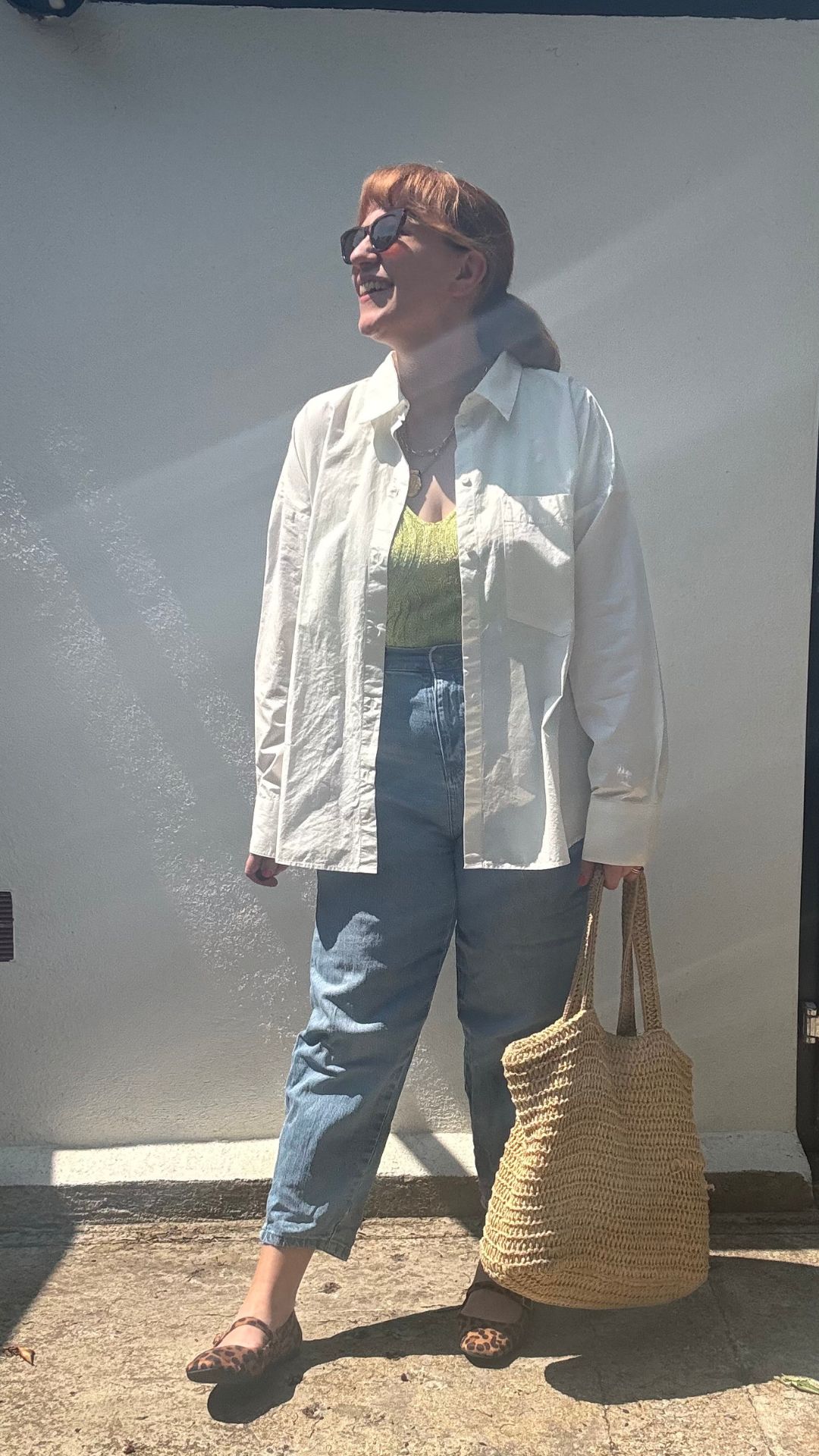 matilda wearing a white shirt and jeans outfit