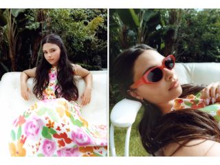 Ariana Greenblatt sitting on couch wearing floral dress.