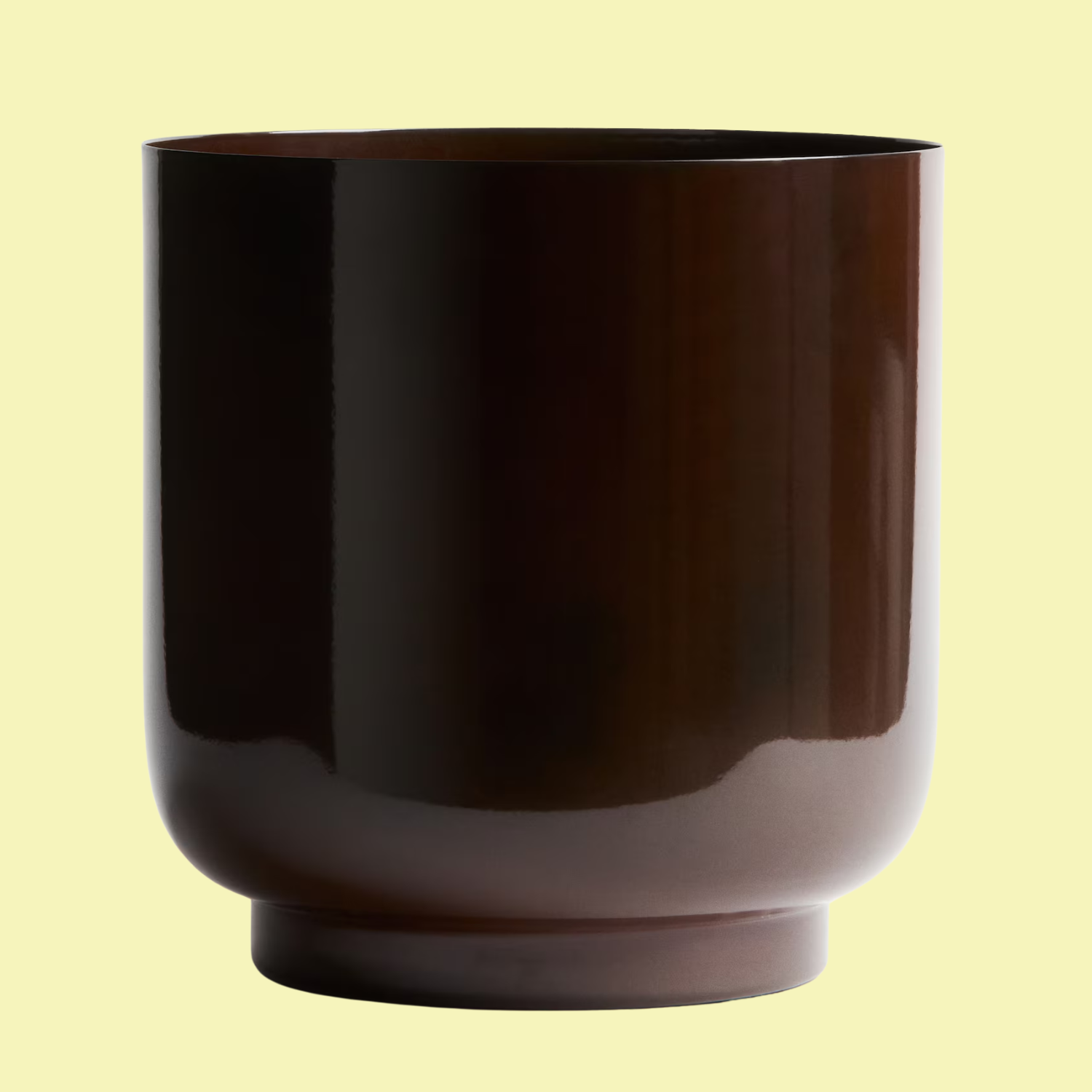 A brown metal planter