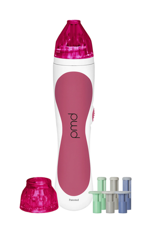 A pink and white PMD Beauty Personal Microderm Classic set against a white background.