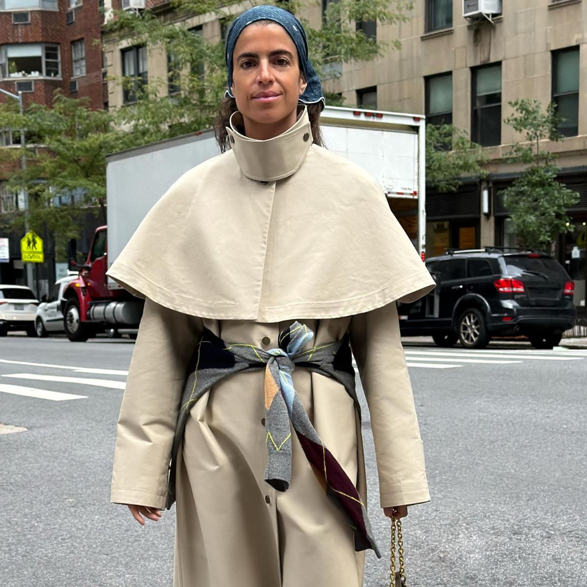 Influencer wearing beige Zara cape trench coat