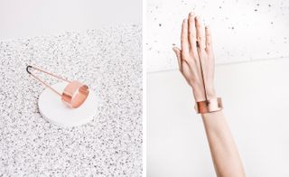 A rose gold bracelet with a wide band for the wrist, and a thin piece that goes in between fingers. The photo to the left displays just the bracelet, while the photo to the right shows it on the hand.