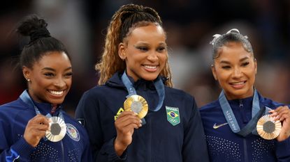 Rebeca Andrade of Team Brazil, and Simone Biles and Jordan Chiles of Team United States make history with the first all-Black podium in the Artistic Gymnastics Women&#039;s Floor Exercise Medal Ceremony at the Paris Olympics 2024.