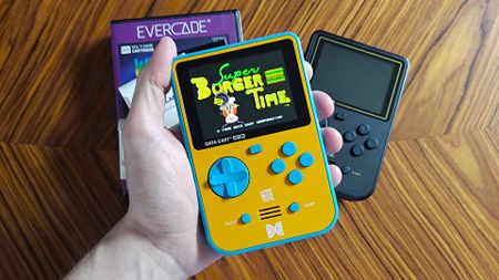 Super Pocket handheld with Super Burger Time title screen displayed.