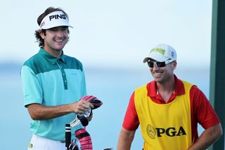 Bubba Watson and caddie Mark Carens share a laugh during the final round of the 2010 PGA Championship