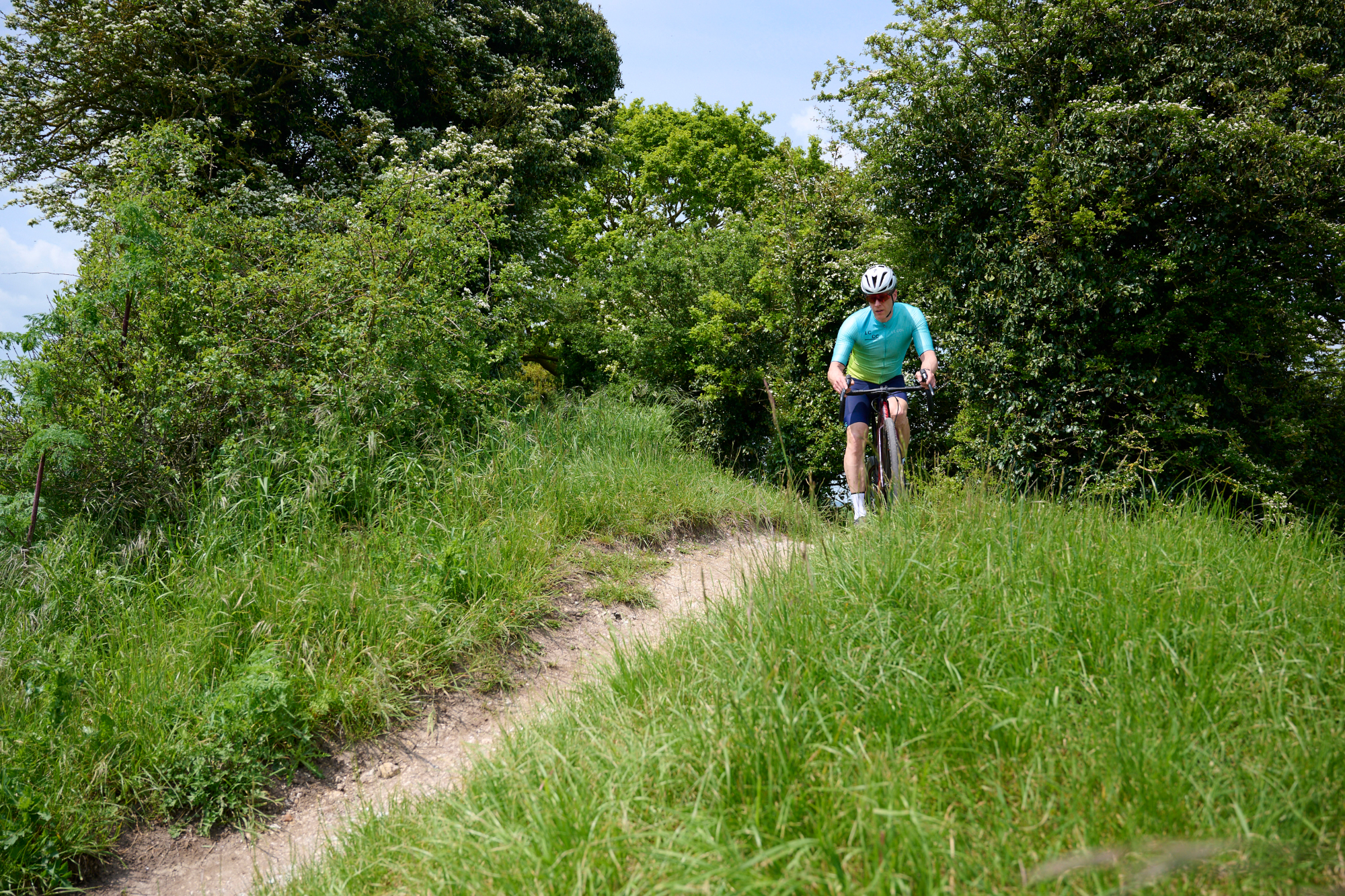 Male cyclist riding a gravel bike