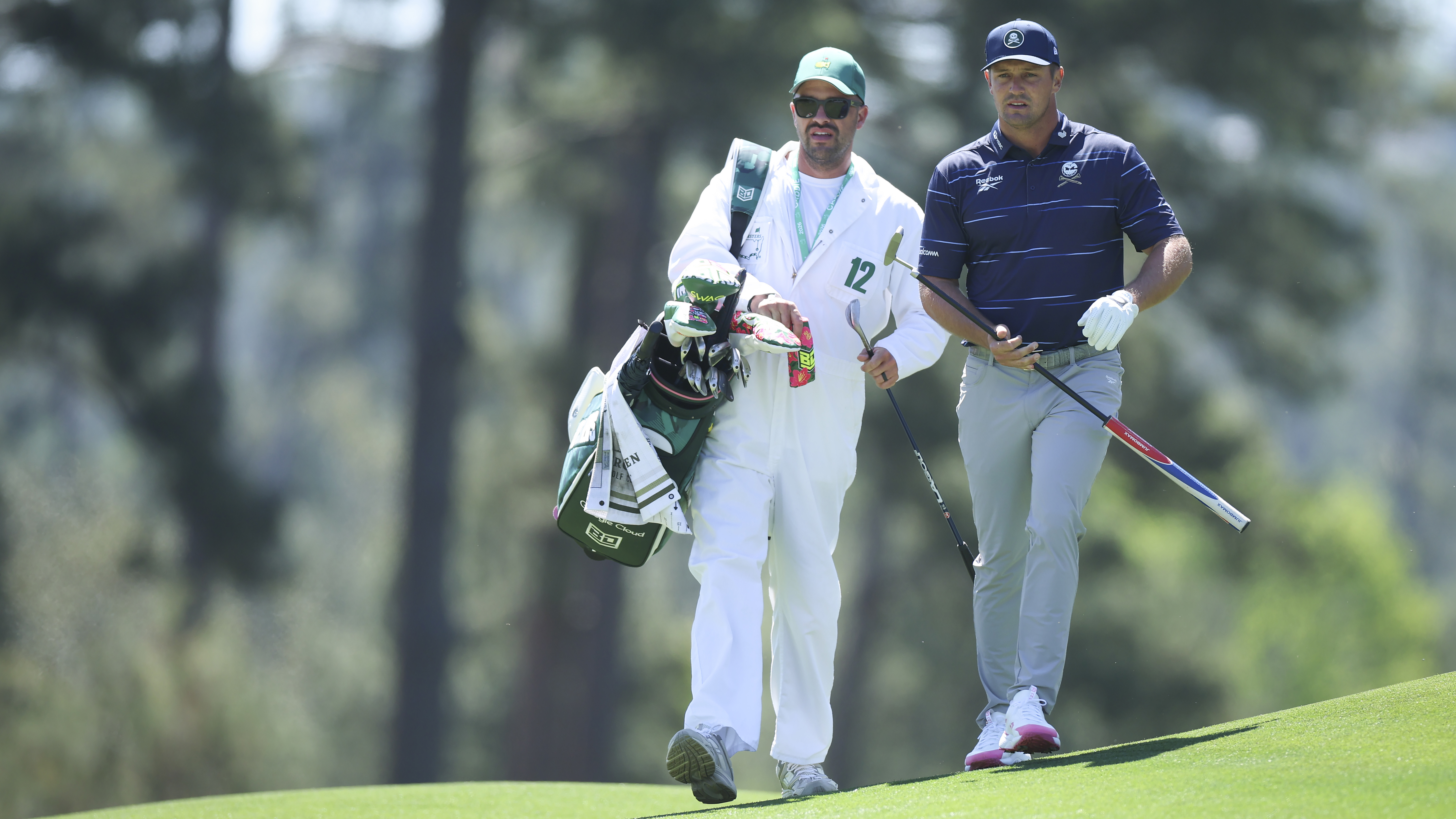 Photo of Bryson DeChambeau walking the Augusta course