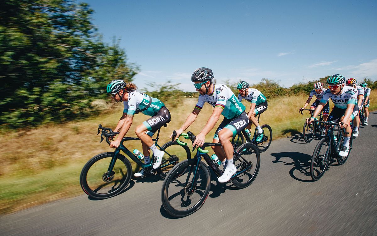 Sagan shares a joke with teammate Daniel Oss