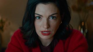 Anne Hathaway staring straight ahead in Verity