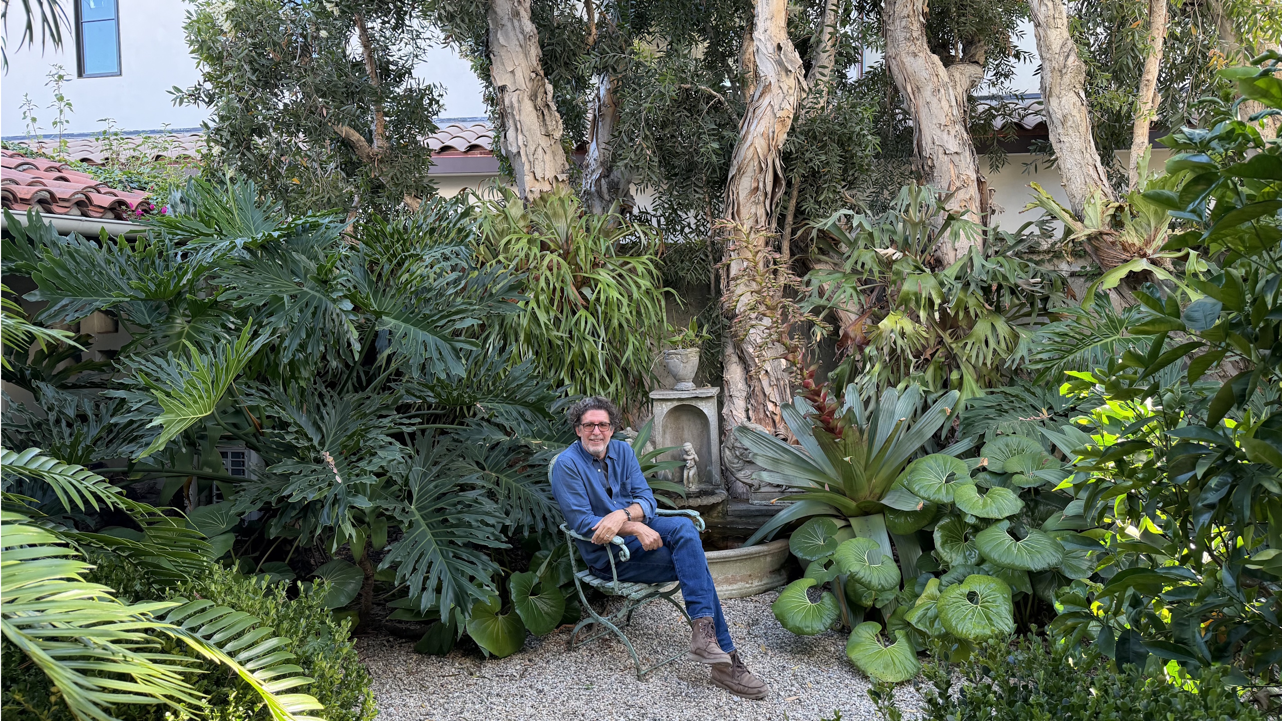 Stephen Block sitting in his garden