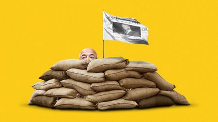 Jeff Bezos surrendering behind a sandbag wall with a white flag fashioned from The Washington Post