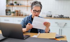 A woman reads surprising news