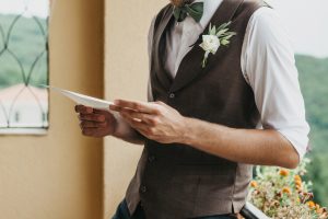 Man reading non-religious wedding ceremony readings.