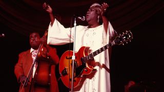 Sister Rosetta Tharpe performs on stage at Hammersmith Odeon, London, 1967. She is playing a Gibson Barney Kessel Regular.