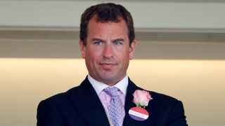 Peter Phillips watches the racing as he attends day 3 of Royal Ascot at Ascot