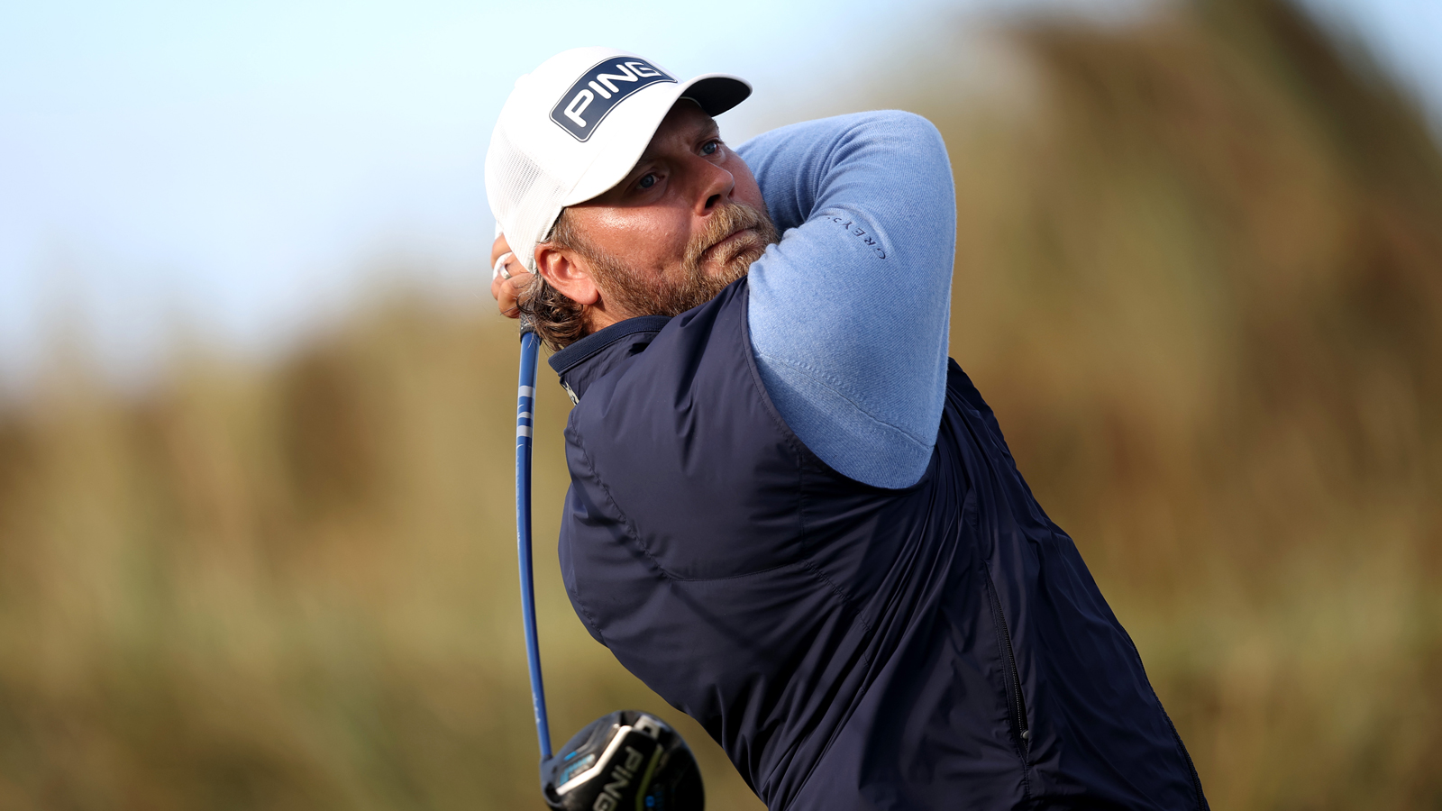 Daniel Brown hits a driver