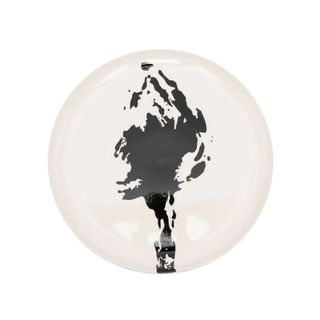 white dinner plate with abstract black print