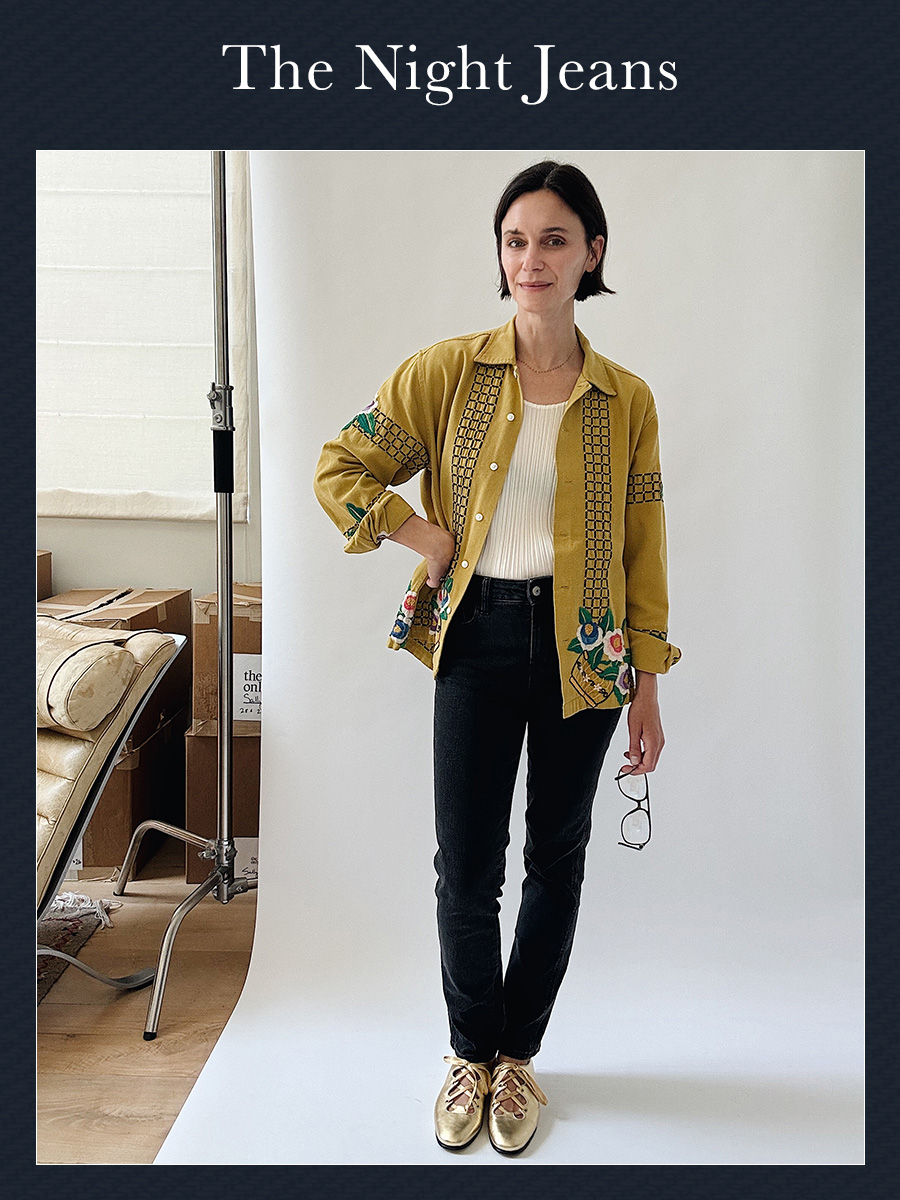 Jane Herman wearing black jeans and a colorful shirt.
