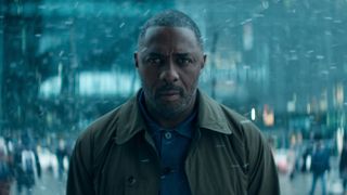 Sam Nelson (Idris Elba) standing in the snow in a scene from "Hijack" season 2