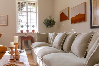 A sofa in a neutrally toned space