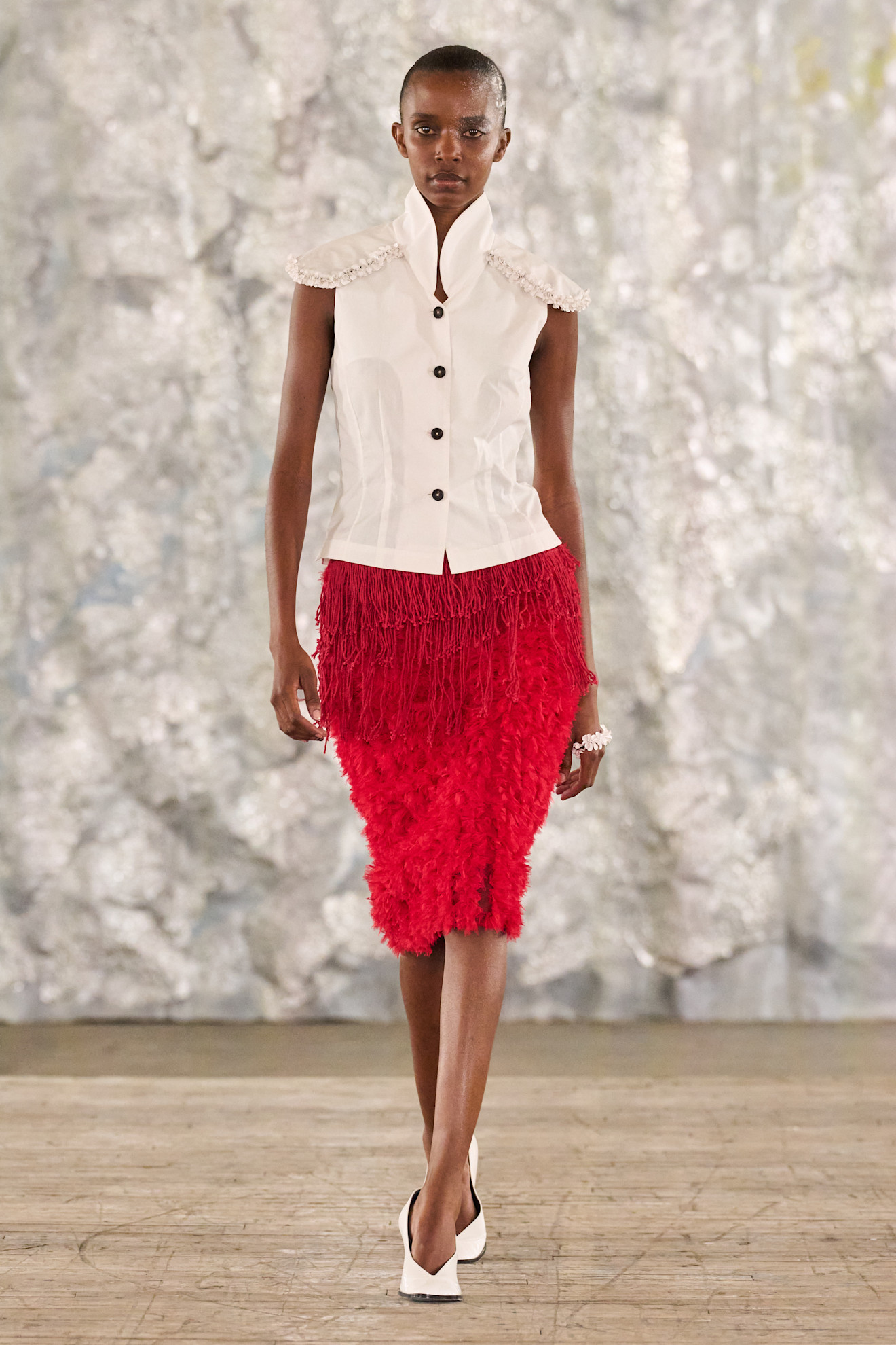 A red skirt on the Diotima runway.