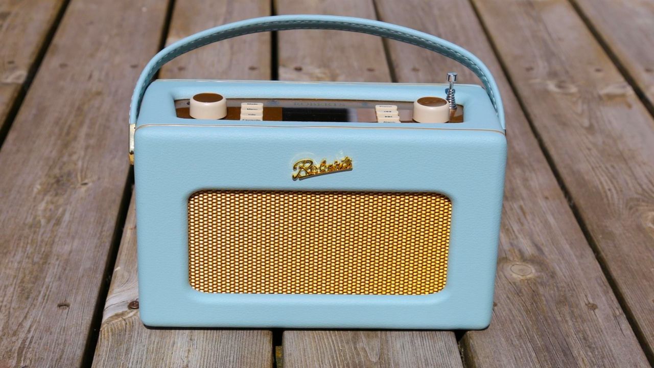 the orberts rveival dab radio on wooden decking