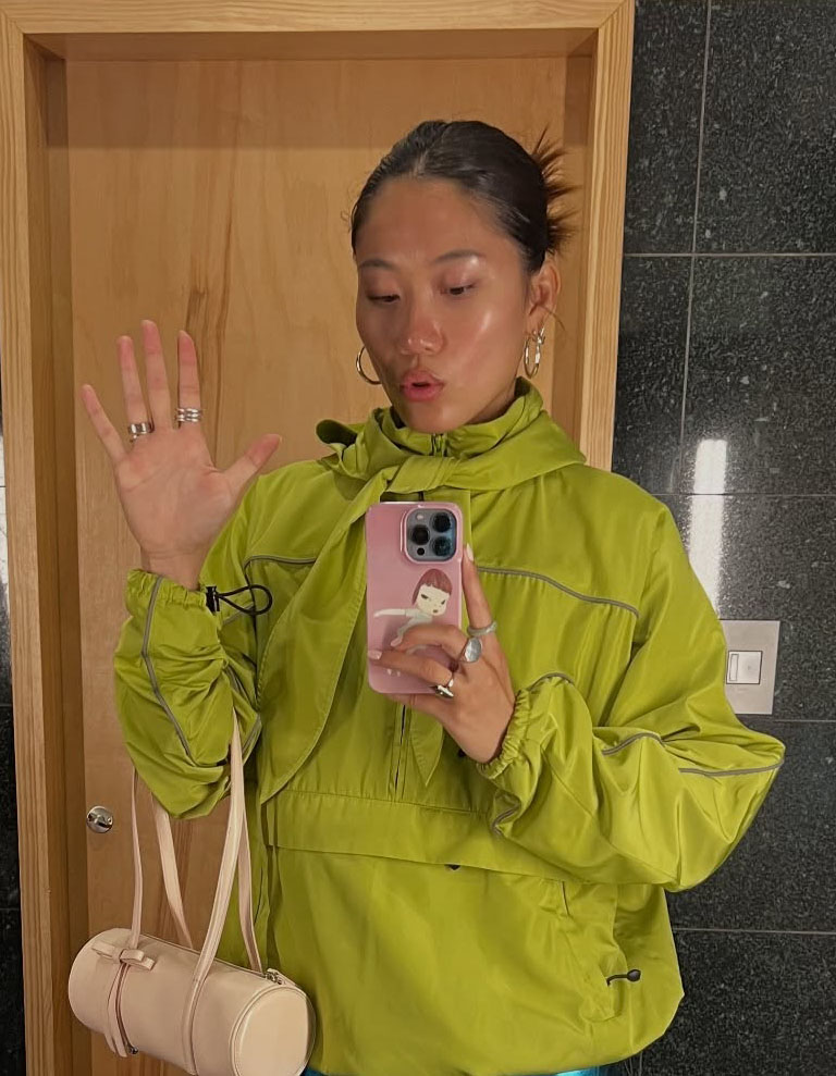 Woman in green sweater