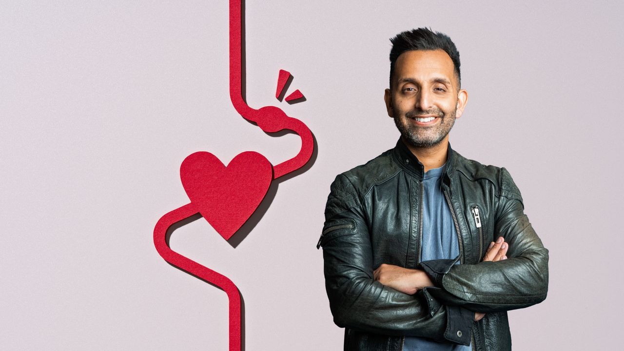 Dr Amir Khan next to heart representing importance of lower cholesterol levels