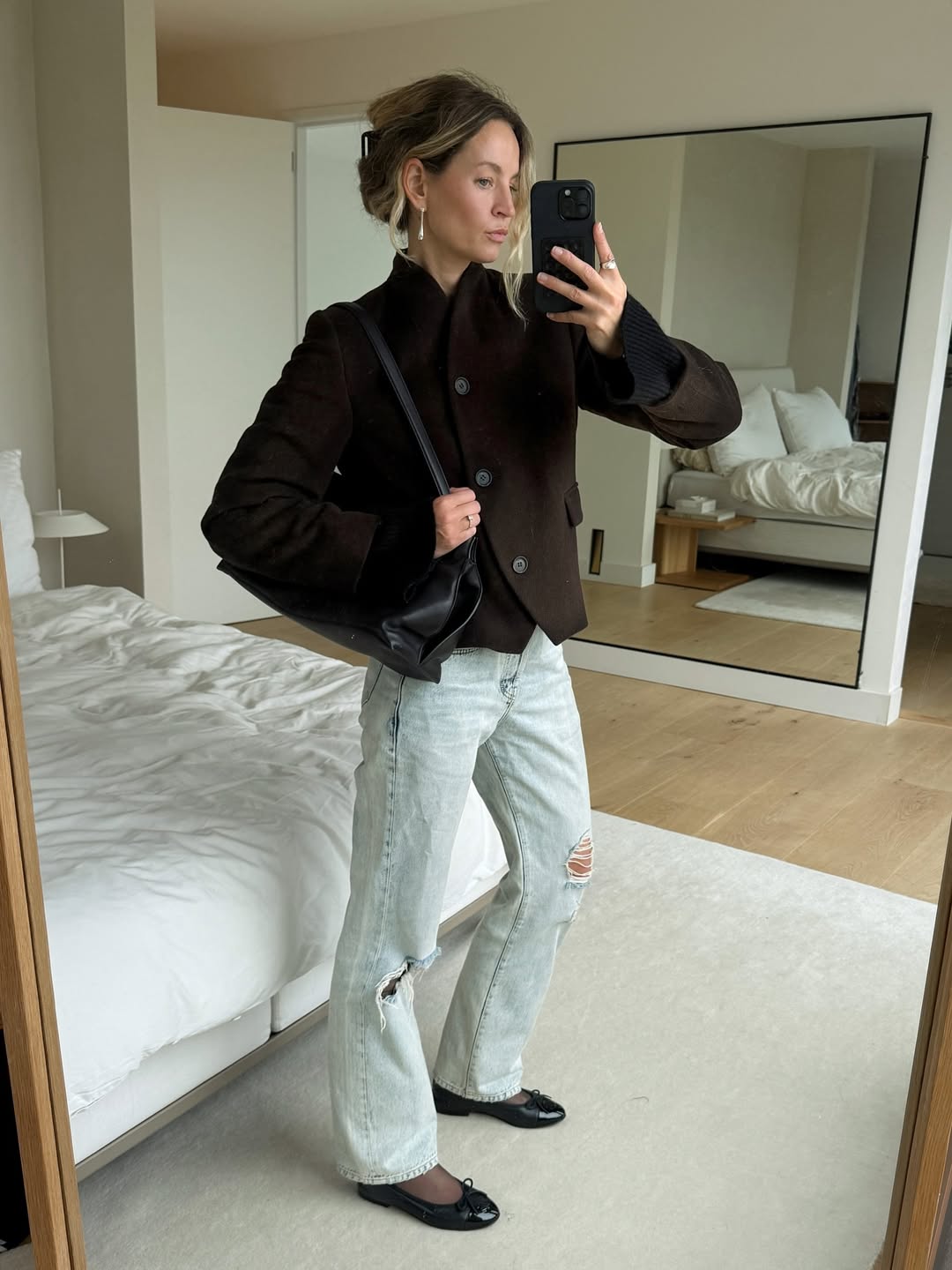 Anouk Yve wearing a Dagmar blazer with the collar upturned