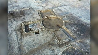 The Roman-era estate's remains include a cylindrical building and a bathhouse. 