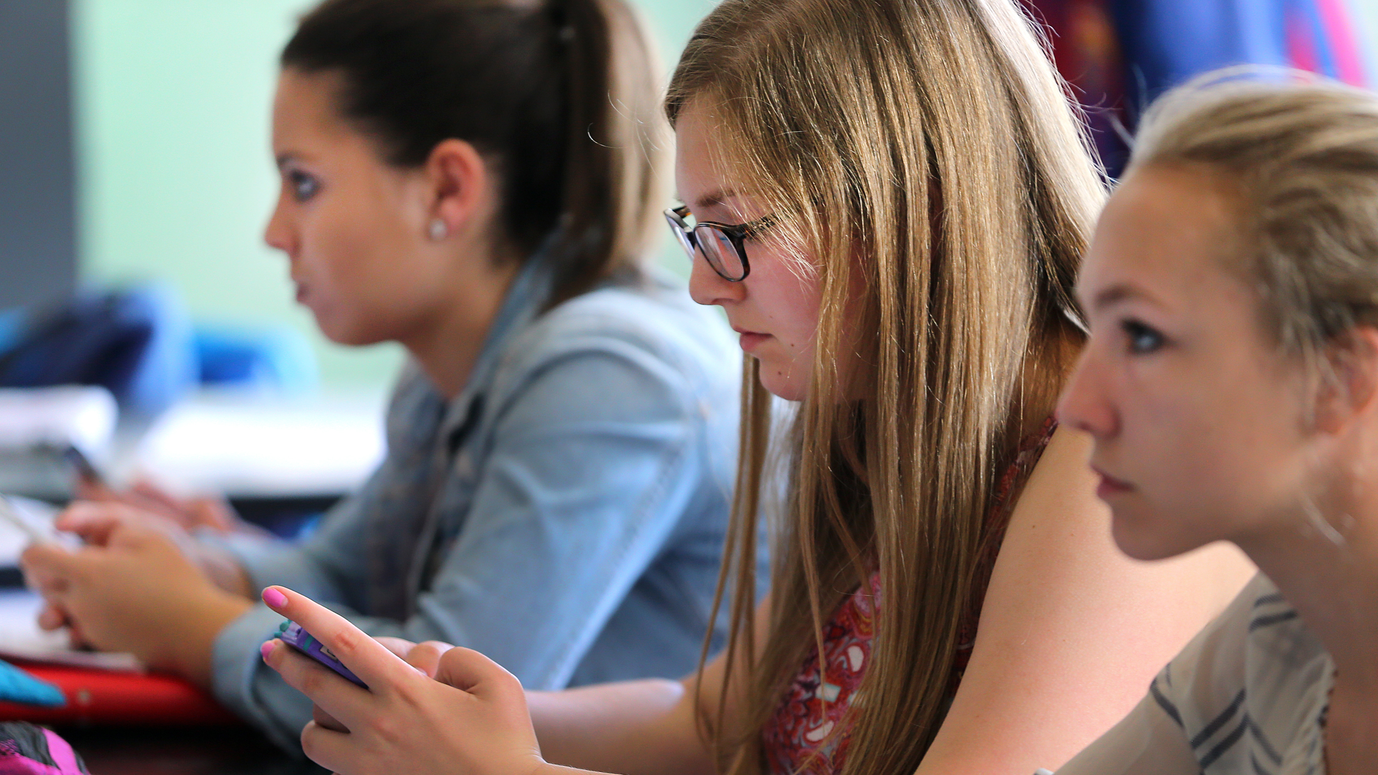 Students using phones in school