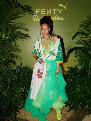 Rihanna arrives to her home country of Barbados to kick off a FENTY x PUMA collection celebration, wearing the Avanti LS, launching this Thursday, March 13th.