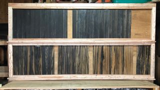 This “Ebony Pantone Scale,” as Bob Taylor calls it, shows the wood’s range of shades.