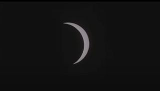 The moon passes in front of the sun in the only total solar eclipse of 2021 in this still from a video captured by Theo Boris and Christian Lockwood of the JM Pasachoff Antarctic Expedition from their observing point in Union Glacier, Antarctica on Dec. 4, 2021.