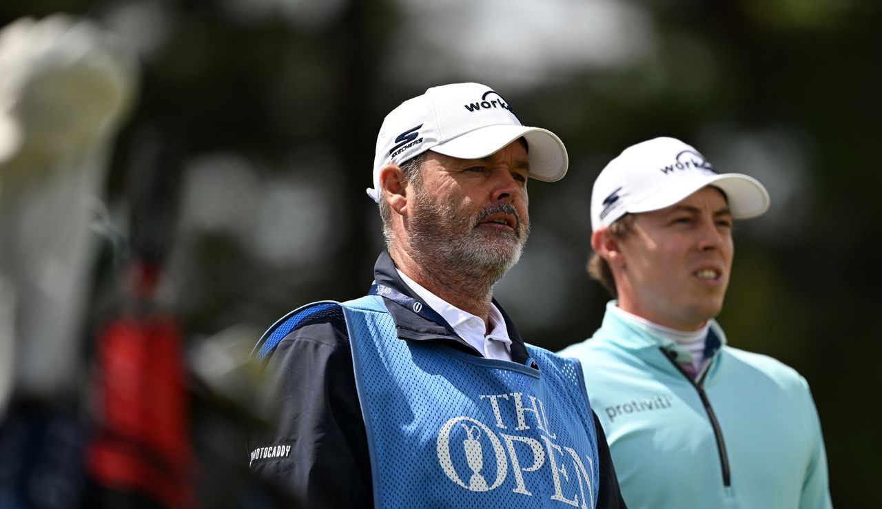 Billy Foster stands next to Matt Fitzpatrick