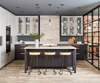 Black and white kitchen with gold and matte black hardware