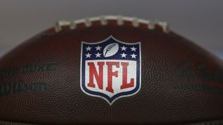 A detail view of the NFL Shield logo on a ball during rookie minicamp at CrossCountry Mortgage Campus on May 10, 2025 in Berea, Ohio.