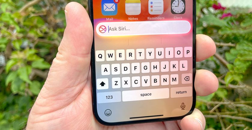 type to siri interface on an iPhone 15 Pro screen