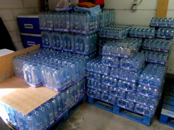 Teams bring their own water to races to prevent any potential contamination from taps.