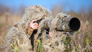 Wildlife photography camouflaged by wearing a ghillie suit
