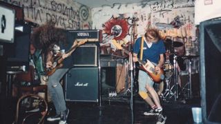 Kurt Cobain (right) plays a 1973 Fender Mustang