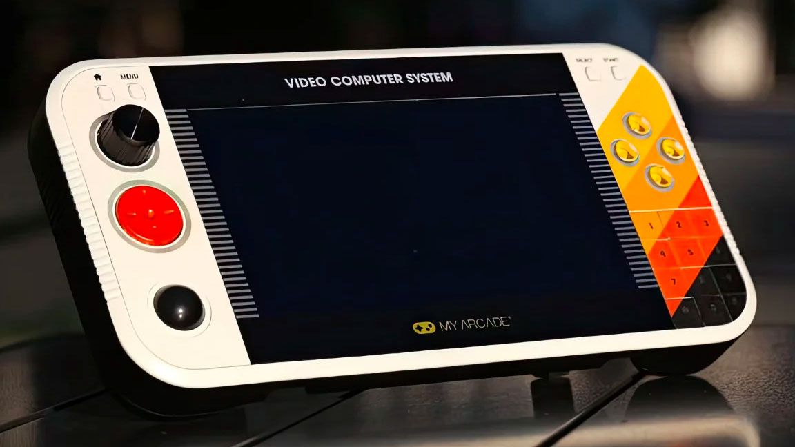 Atari Gamestation Portable; a retro console handheld on a park bench