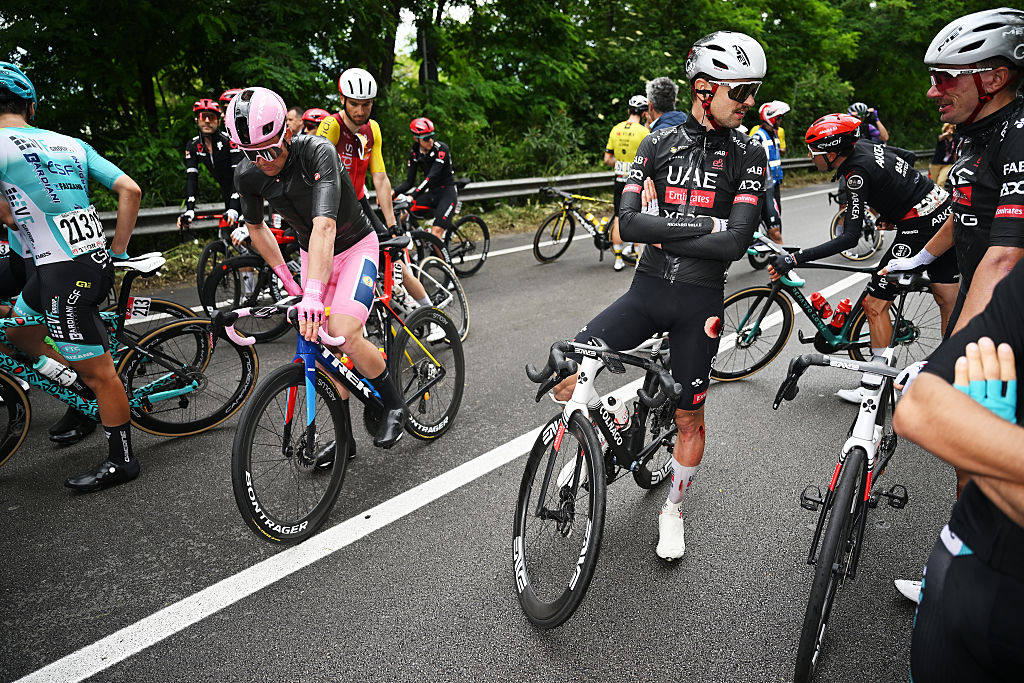 NAPOLI ITALY MAY 15 LR Mads Pedersen of Denmark and Team Lidl Trek Pink Leader Jersey and Jay Vine of Australia and Team UAE Team Emirates XRG while the race is neutralized due to a crash in the peloton during the 108th Giro dItalia 2025 Stage 6 a 227km stage from Potenza to Napoli UCIWT on May 15 2025 in Potenza Italy Photo by Dario BelingheriGetty Images