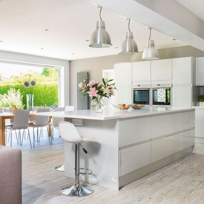 Large kitchen extension with neutral units, and large opening to the garden