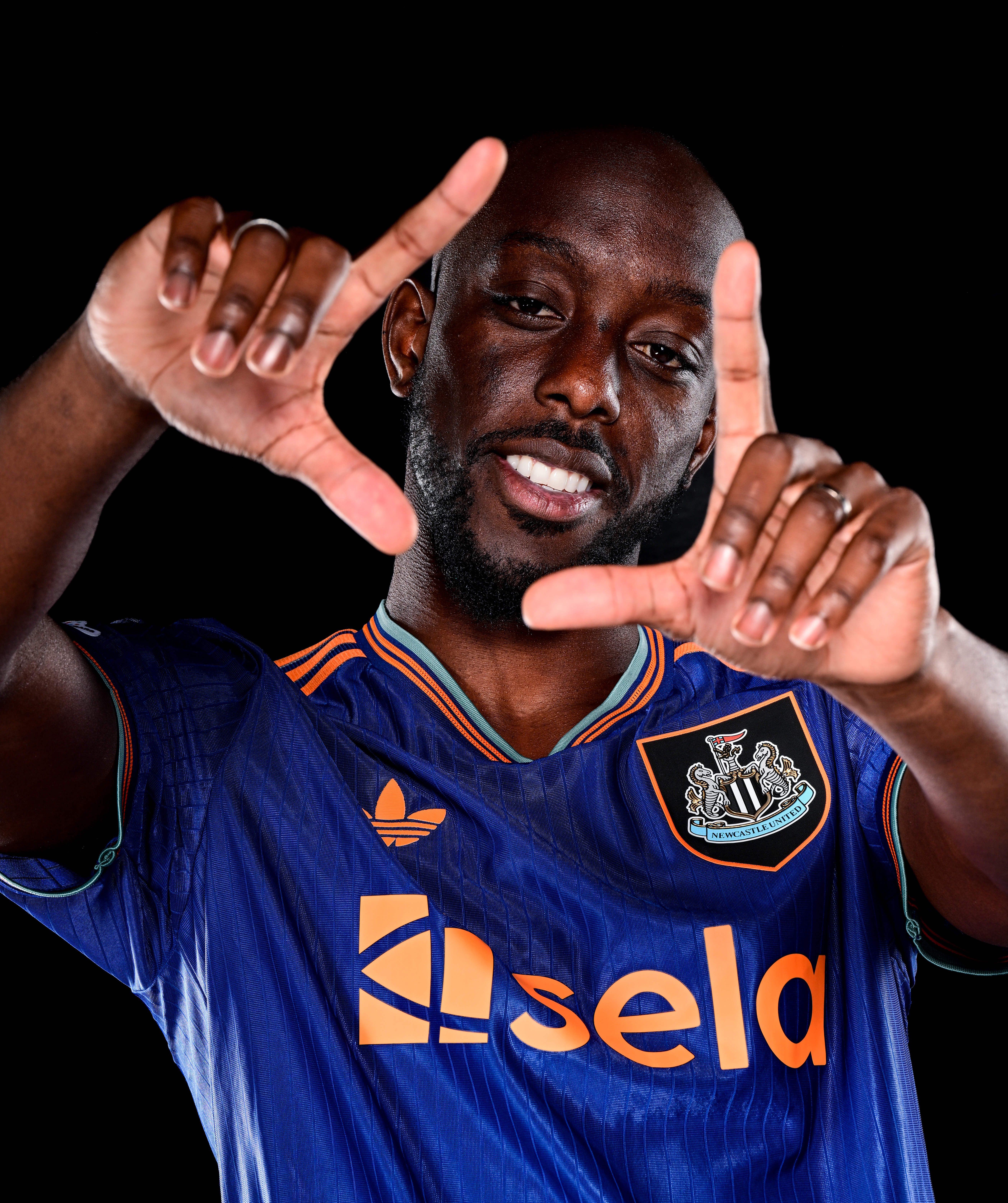 NEWCASTLE, ENGLAND - SEPTEMBER 1: Yoane Wissa poses for photographs after signing for Newcastle United at the Newcastle United Training Centre on September 1, 2025 in Newcastle upon Tyne, England. (Photo by Serena Taylor/Newcastle United via Getty Images)