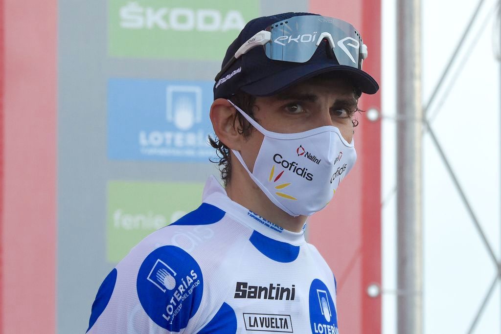 Team Cofidis' French rider Guillaume Martin poses on the podium after the 12th stage of the 2020 La Vuelta cycling tour of Spain, a 109.4-km race from Pola de Laviana to Alto de l'Angliru, on November 1, 2020. (Photo by MIGUEL RIOPA / AFP) (Photo by MIGUEL RIOPA/AFP via Getty Images)