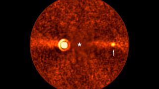 This image, taken with ESO&rsquo;s Very Large Telescope (VLT) shows Beta Pictoris d, a new planet found orbiting the star Beta Pictoris. The star is at the centre of the frame, and was subtracted when processing the data, revealing the environment around it. The new planet, indicated with an arrow, is the third one found around this star. The other two are Beta Pictoris b &ndash;&ndash; the bright source to the left, and Beta Pictoris c, orbiting much closer to the star and not seen here. The image was taken with the ERIS instrument at the VLT. Based on its infrared brightness and colour, the new planet appears to be a gas giant, about 2.4 times more massive than Jupiter. The diffuse horizontal band in this image is a debris disc around the star, seen here edge-on, the leftover material of planetary formation.